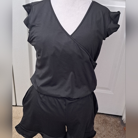 Black Romper With A Ruffled Short/Swimsuit - Picture 7 of 9
